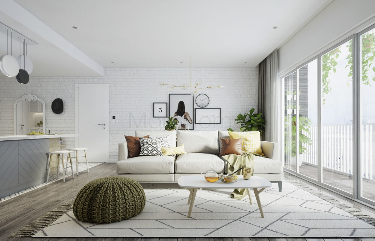 Compact Scandinavian living room arranged with a slim sofa and round light wood table