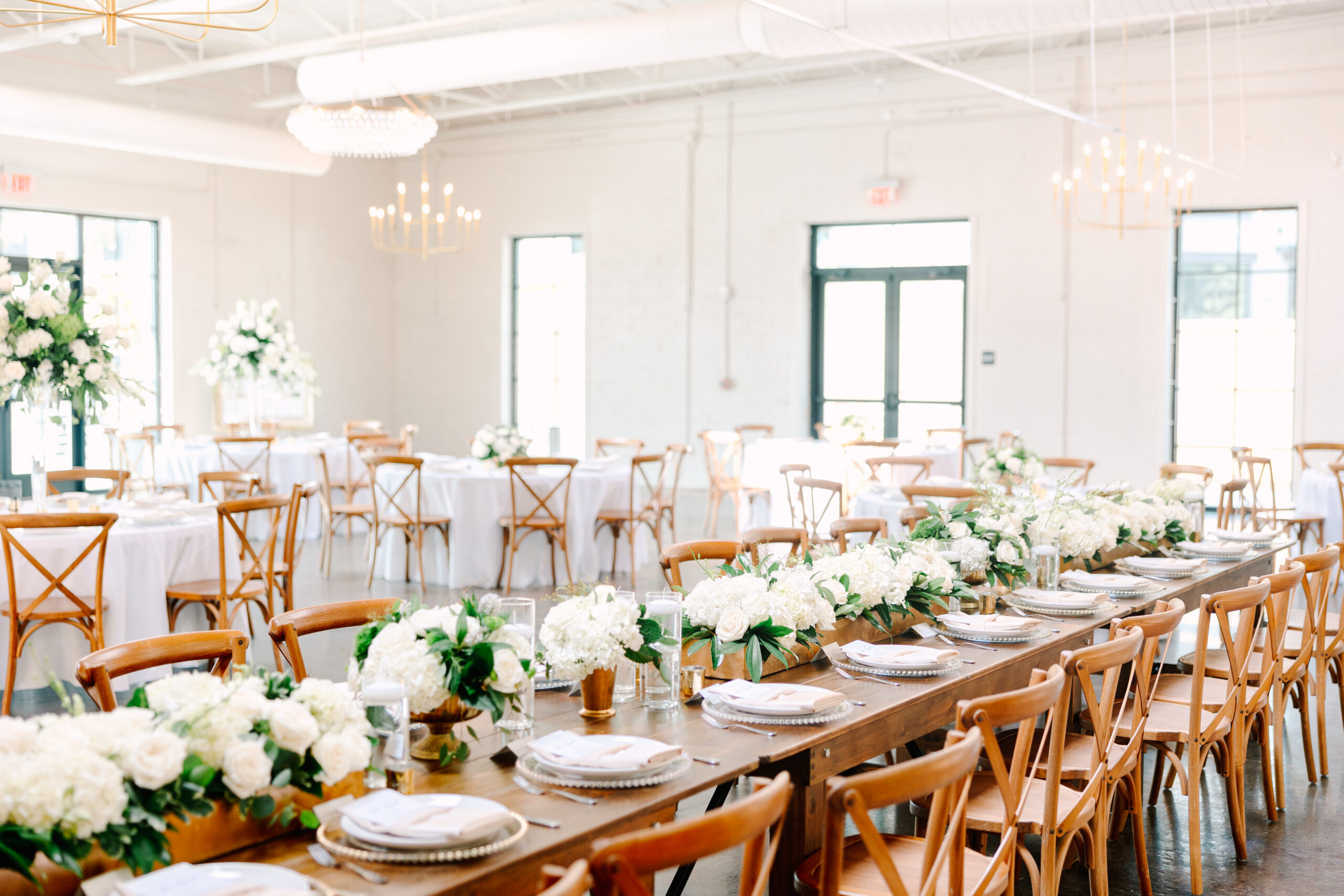 Wedding planning materials used to organize a realistic budget and purchase priorities