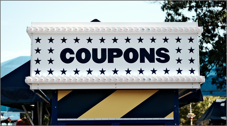 Coupon sign outside a storefront