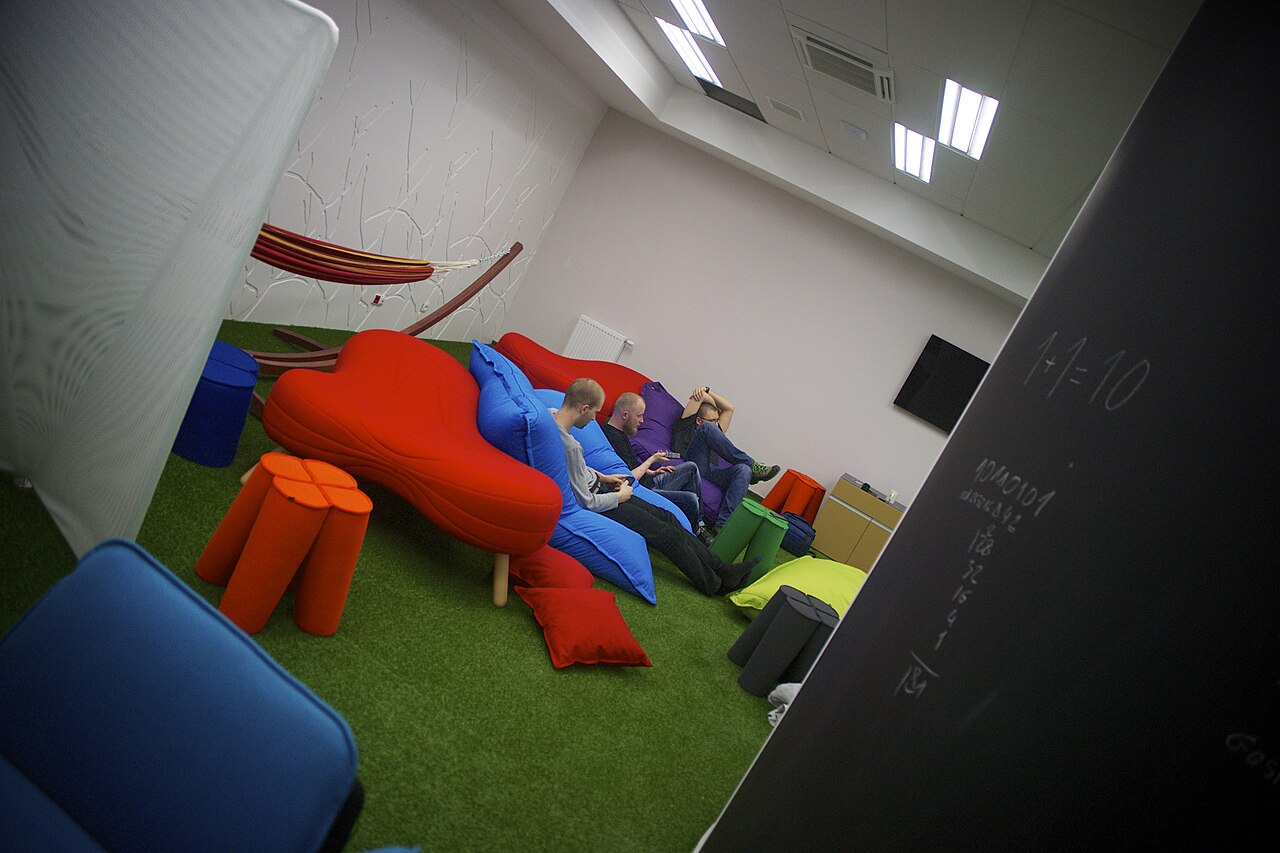 Assorted bean bag chairs in a living room, illustrating shape and fabric variety across marketplaces