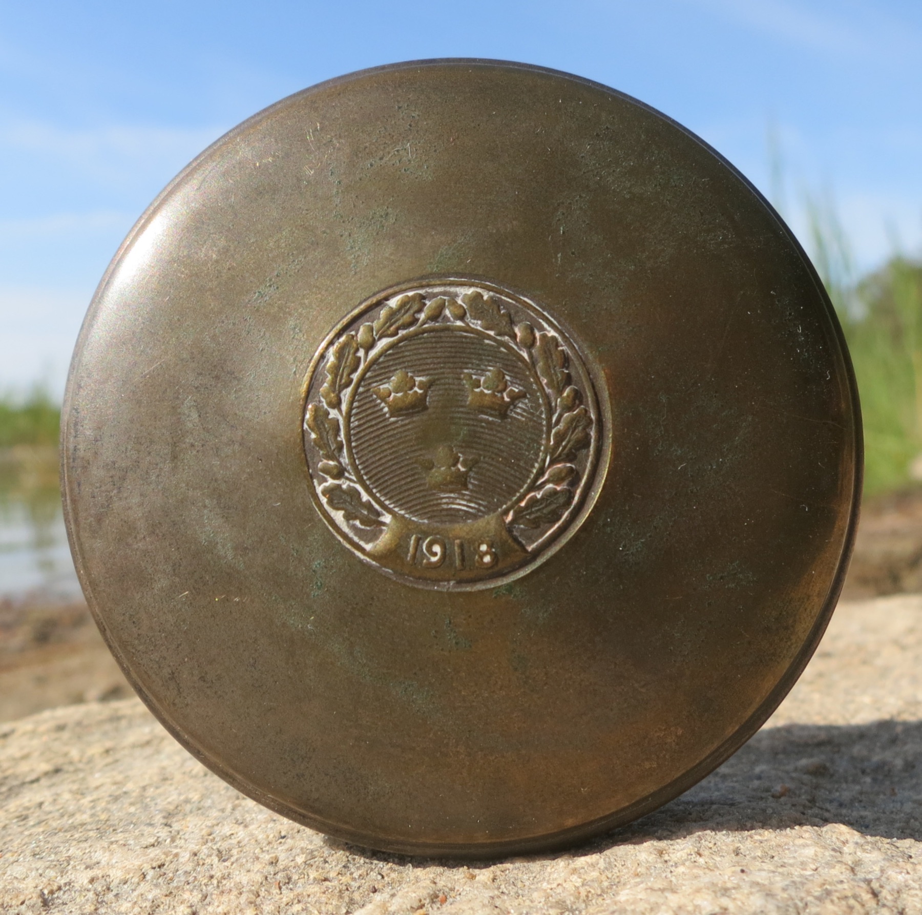 Brass sugar tin on a shelf
