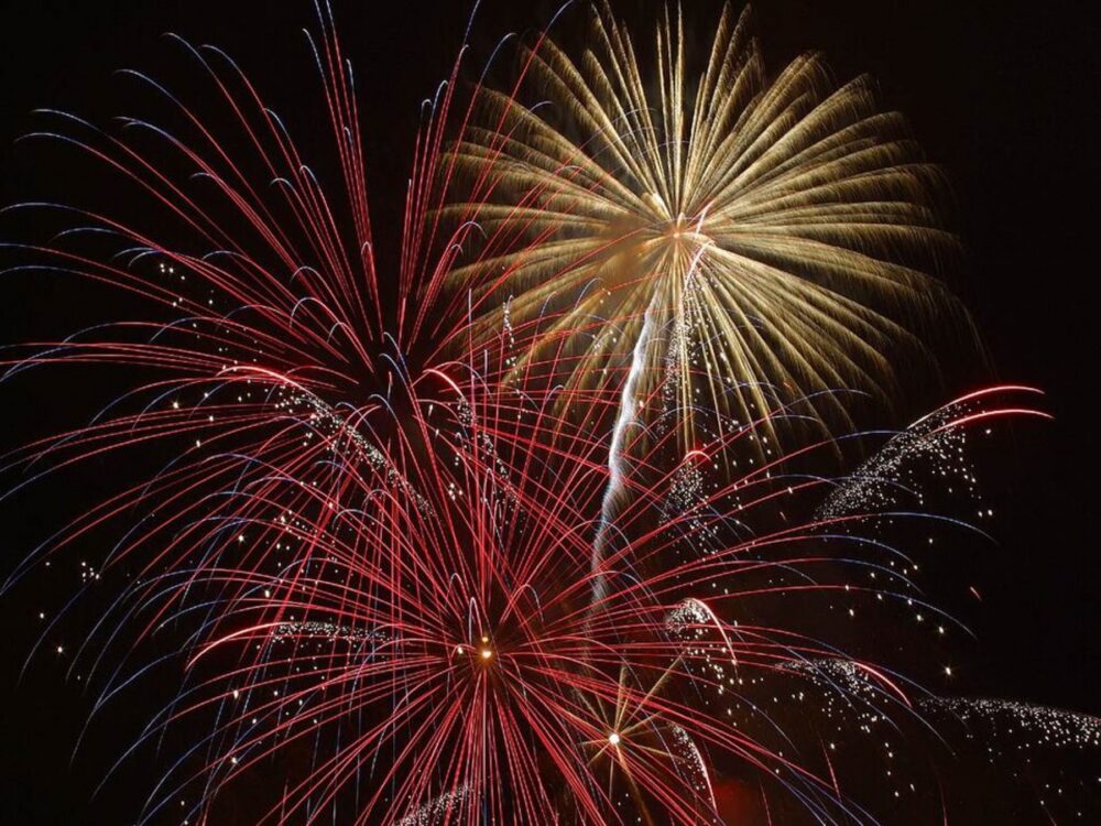 Firework-style burst of light against a dark sky