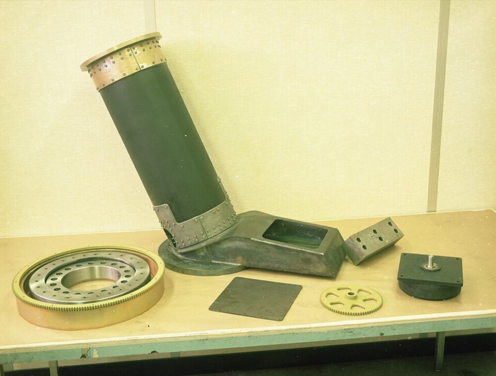 Mechanical components and parts laid out in rows