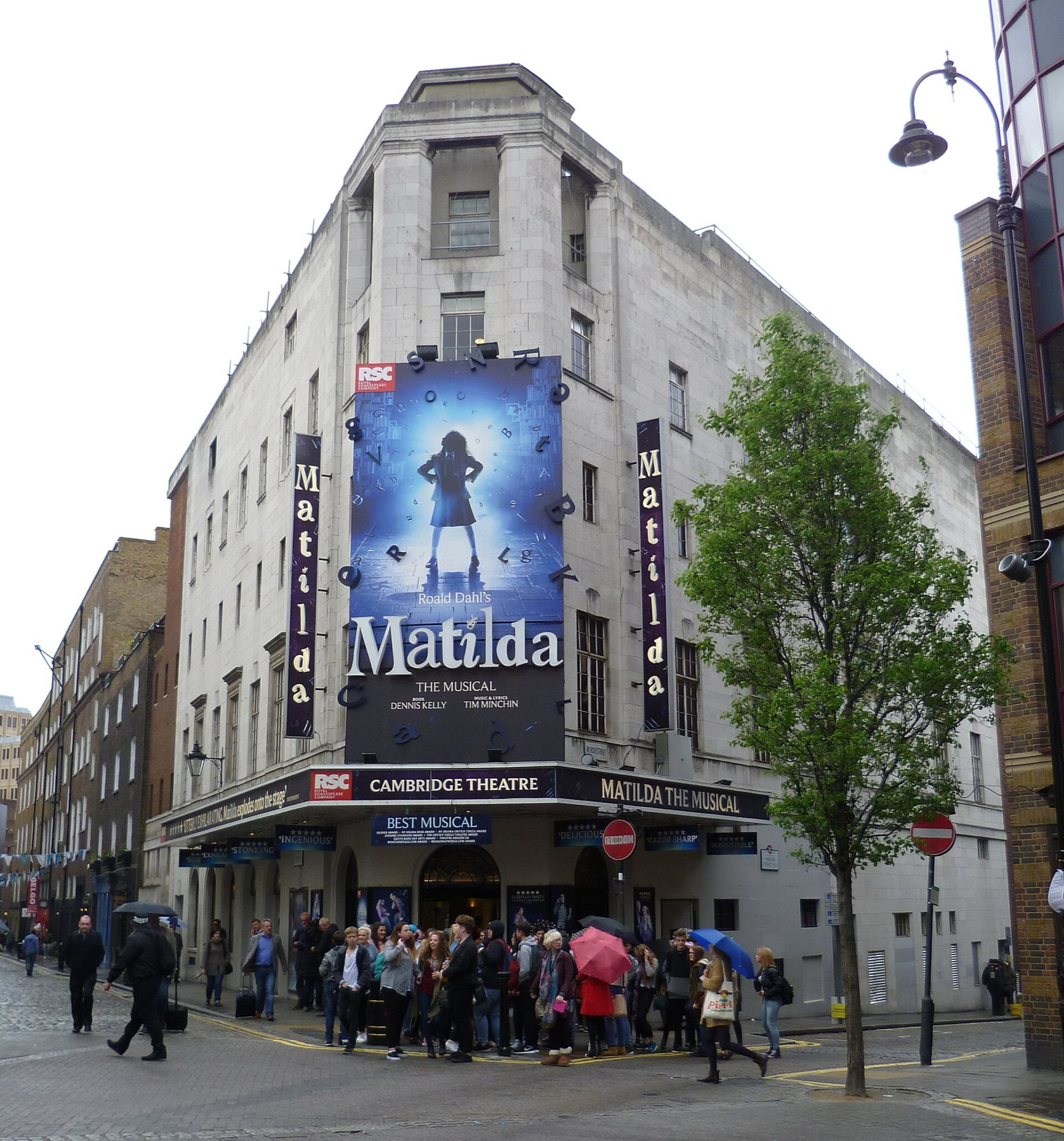 Exterior of the Cambridge Theatre showing Matilda The Musical signage