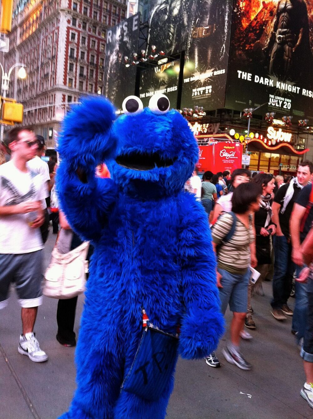 Close-up of a Cookie Monster plush toy highlighting stitching and fabric texture.