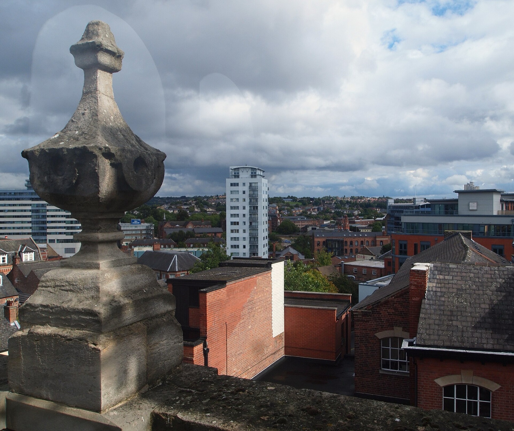 View over rooftops in a historic lace market district, symbolising diverse fashion trading hubs.