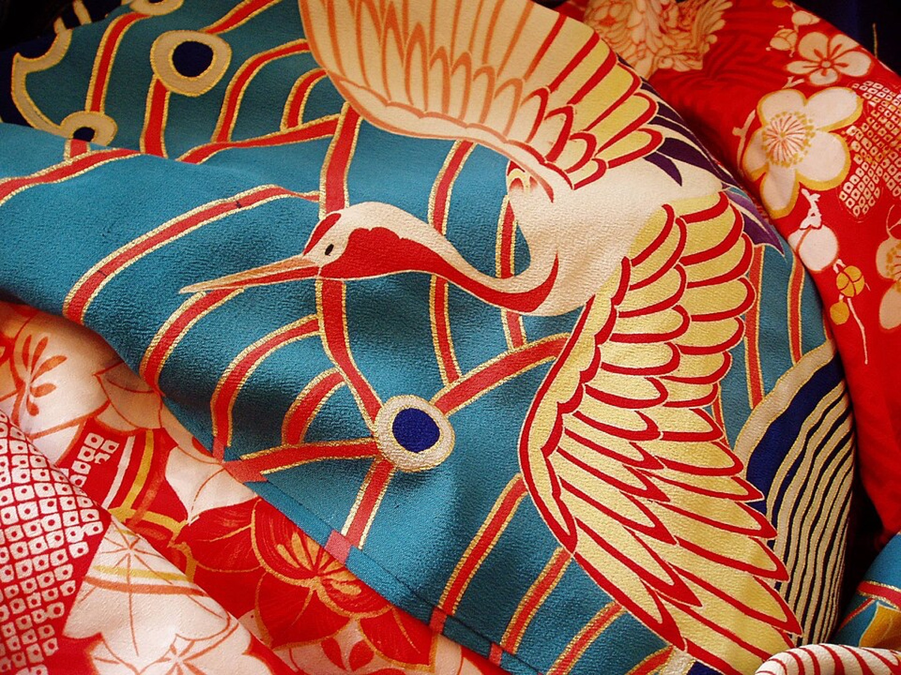 Assorted kimono fabrics illustrating variety of prints and materials