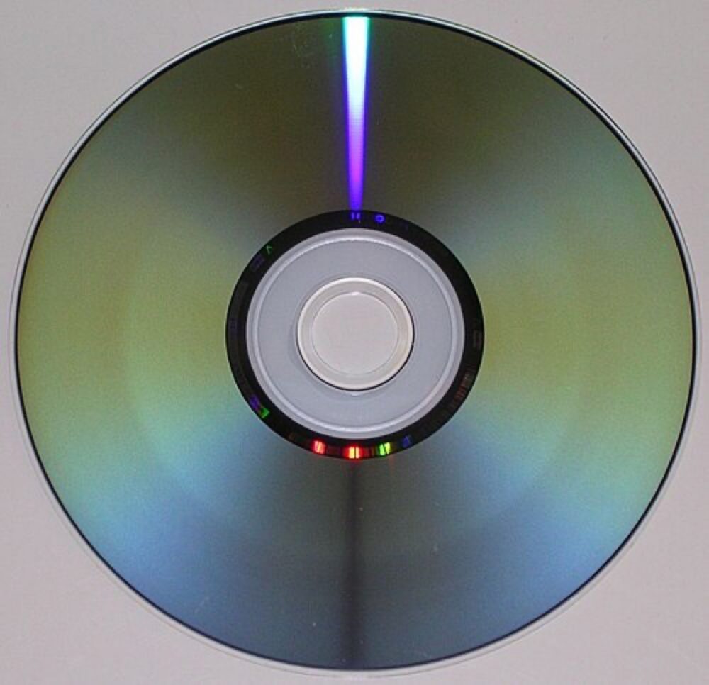 Stack of DVD discs on a spindle