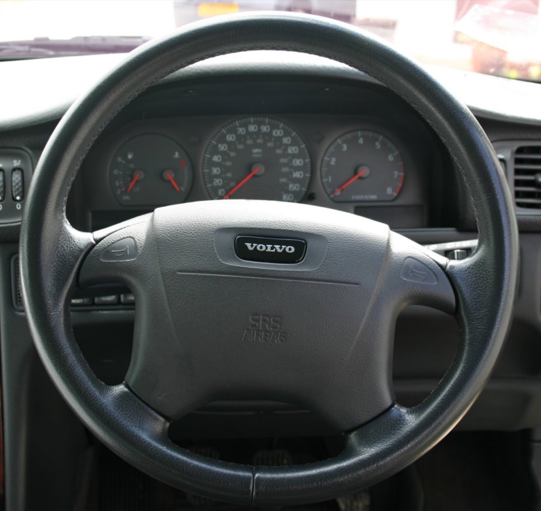 Generic car steering wheel close-up