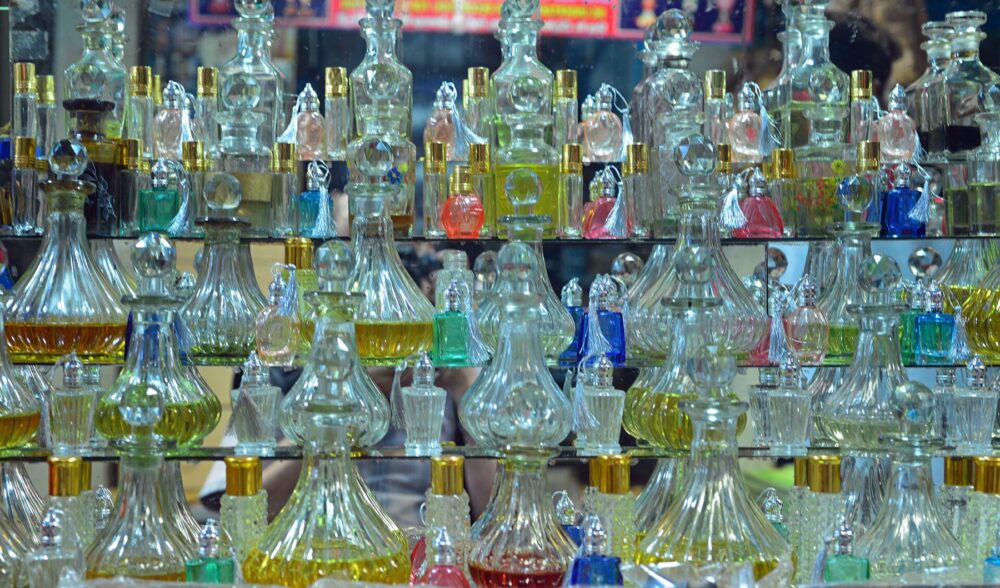 Small bottles of essential oils and perfume on a table