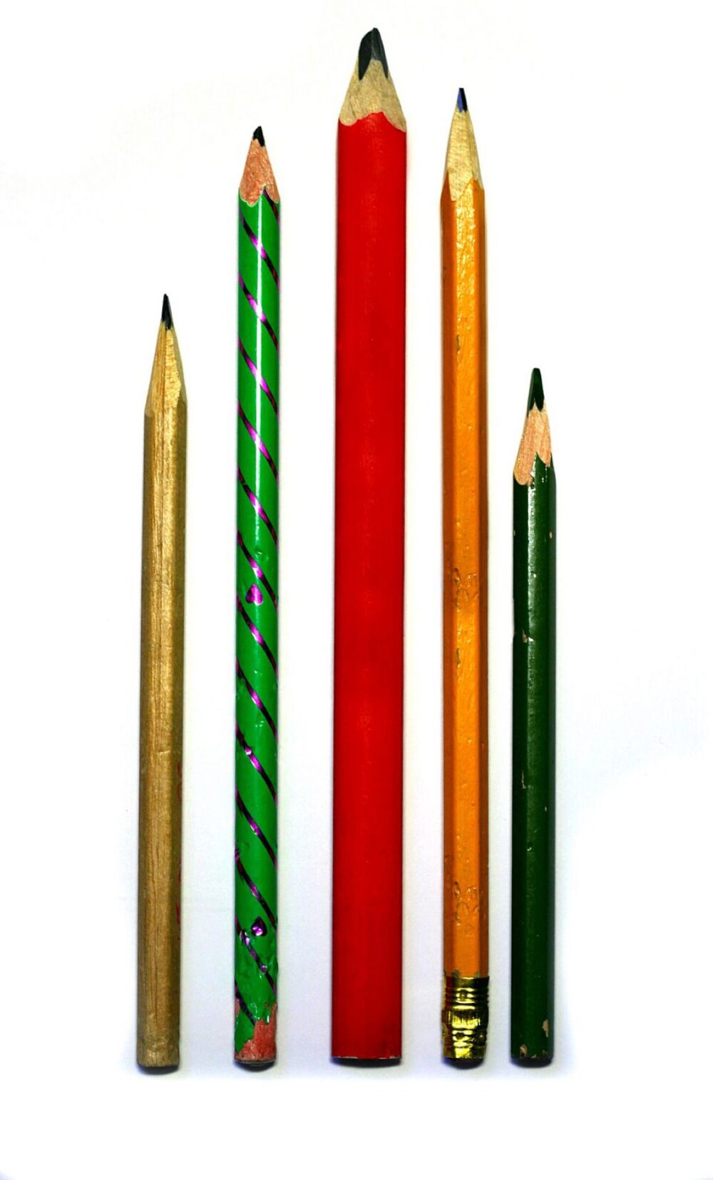 Assorted wooden pencils of different colors and styles