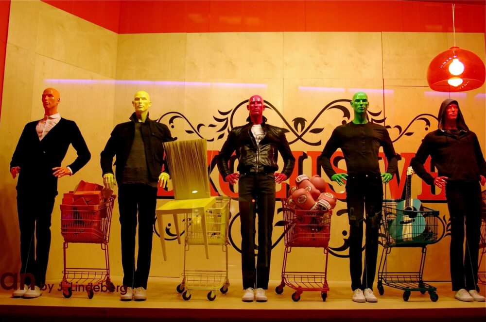 Interior of a men’s clothing store illustrating variety and merchandising choices across marketplaces