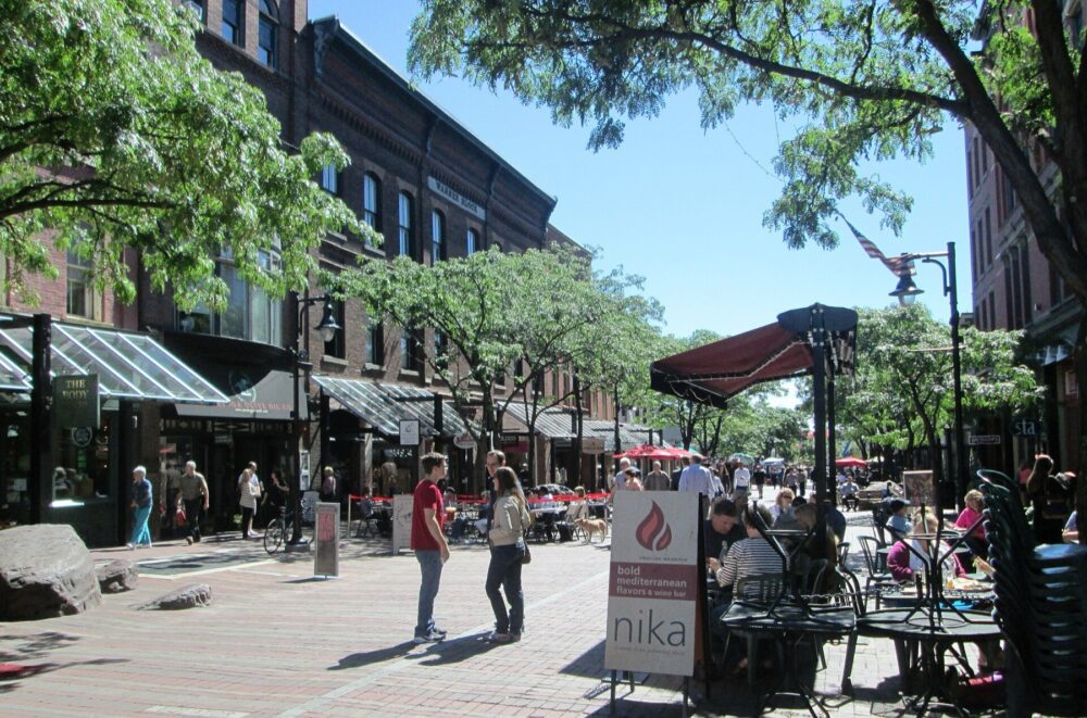Church Street pedestrian marketplace with shoppers walking between storefronts