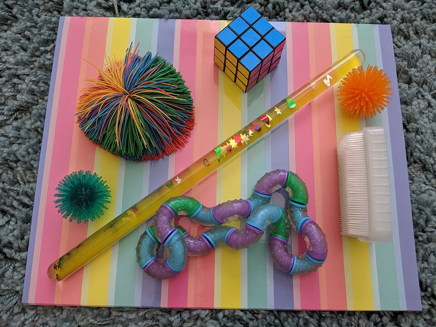 Mixed fidget and squishy toys on a tabletop