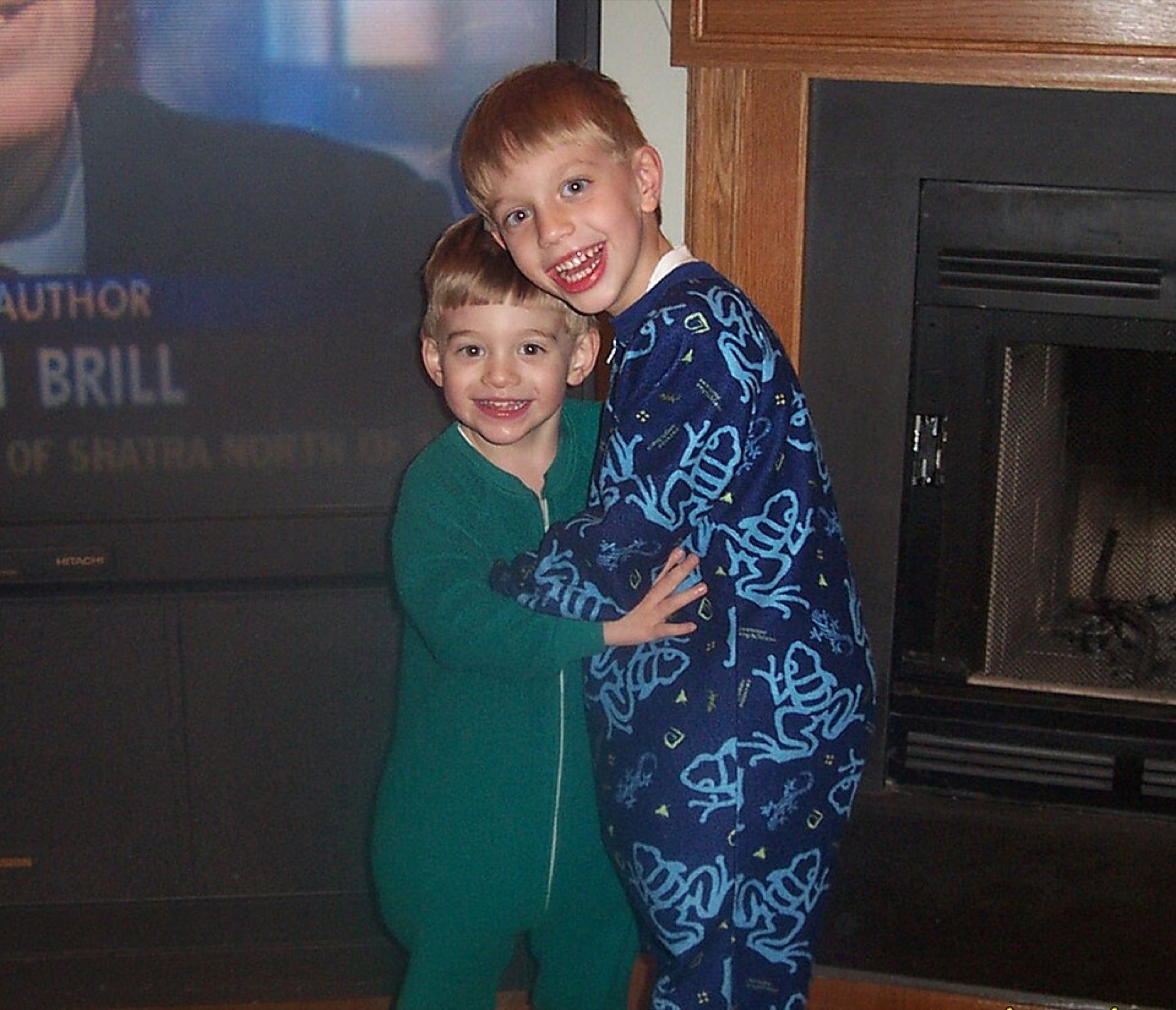 Kids wearing pajamas on a couch