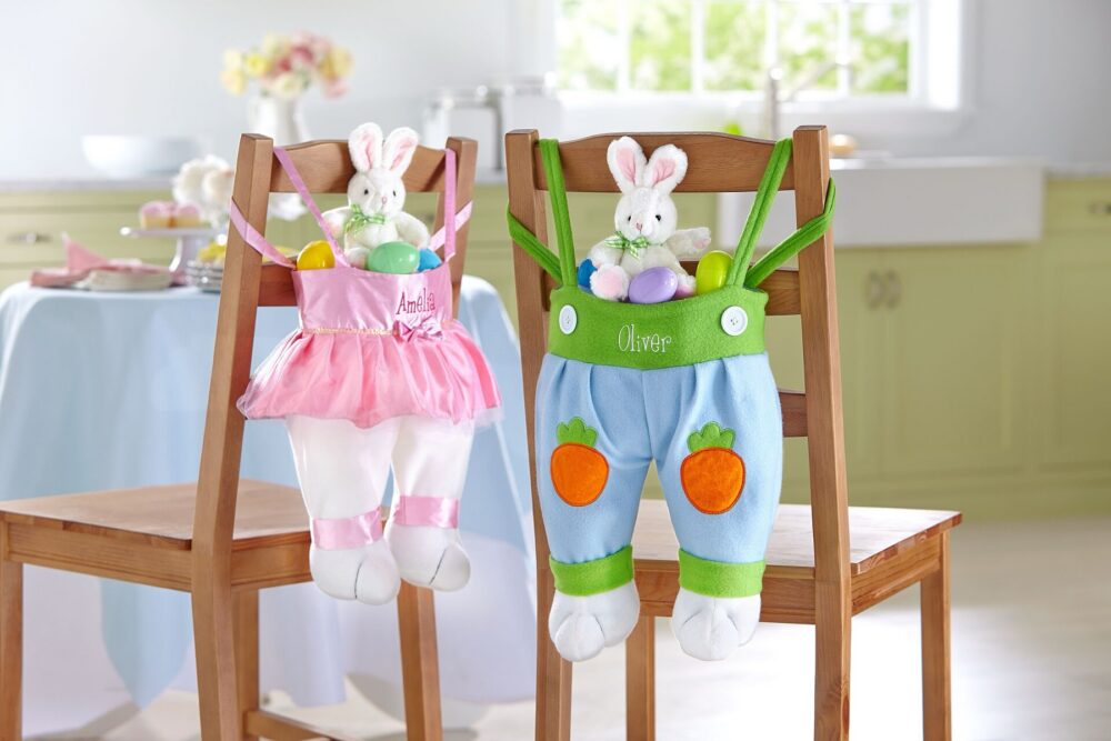 Easter baskets with plush bunny toys hanging on wood chairs