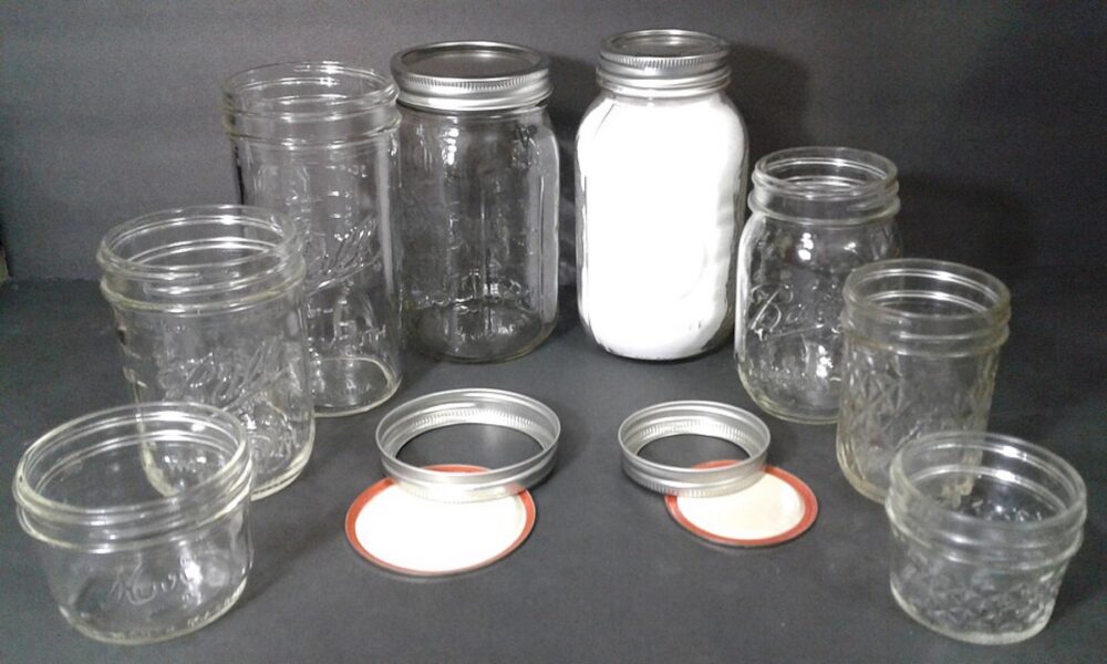 Assorted mason jars suitable for centerpieces and favors