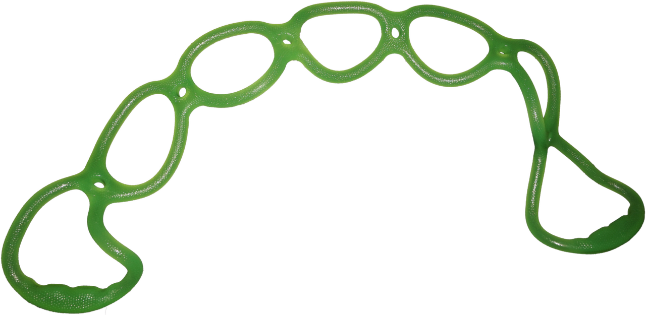 Strength band lying on a flat surface, illustrating typical resistance band form factor