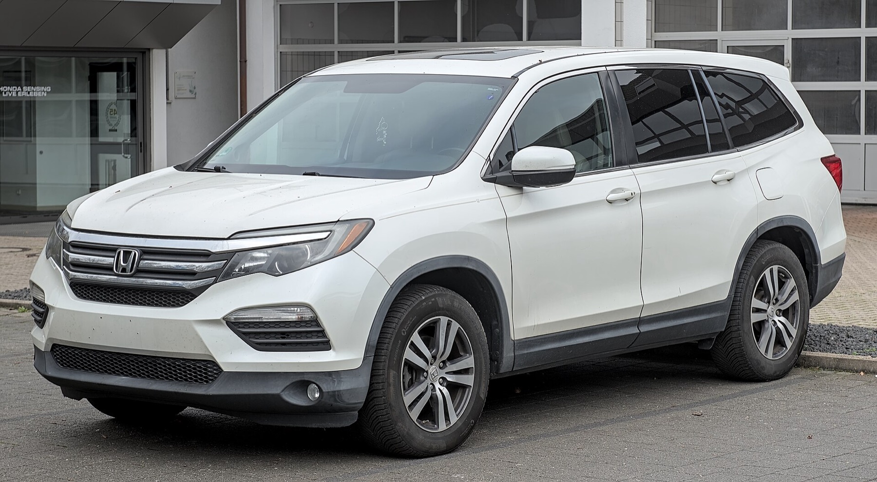 Front view of a Honda Pilot showing the headlight assemblies