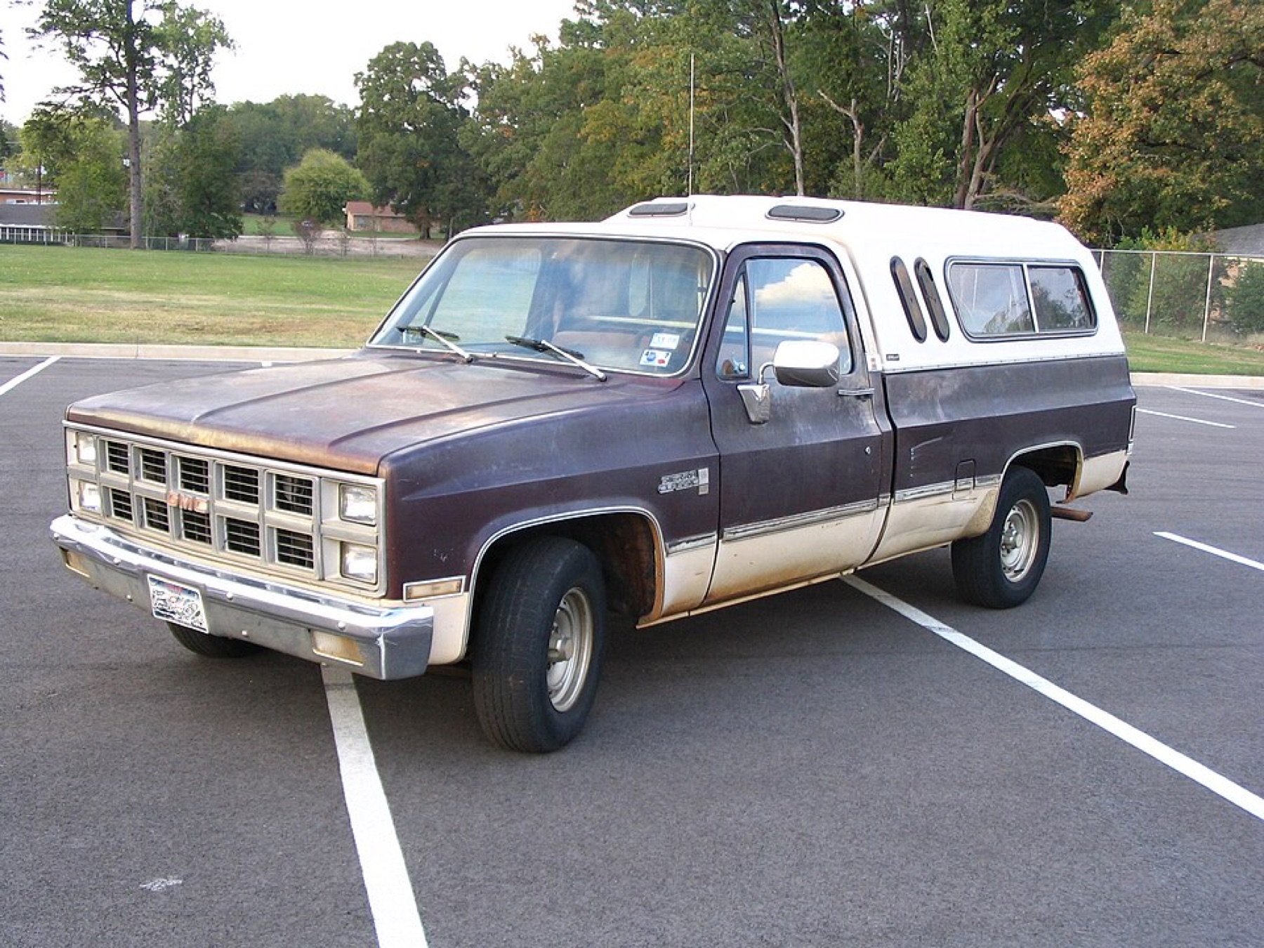 Front view of a GMC pickup truck showing grille area