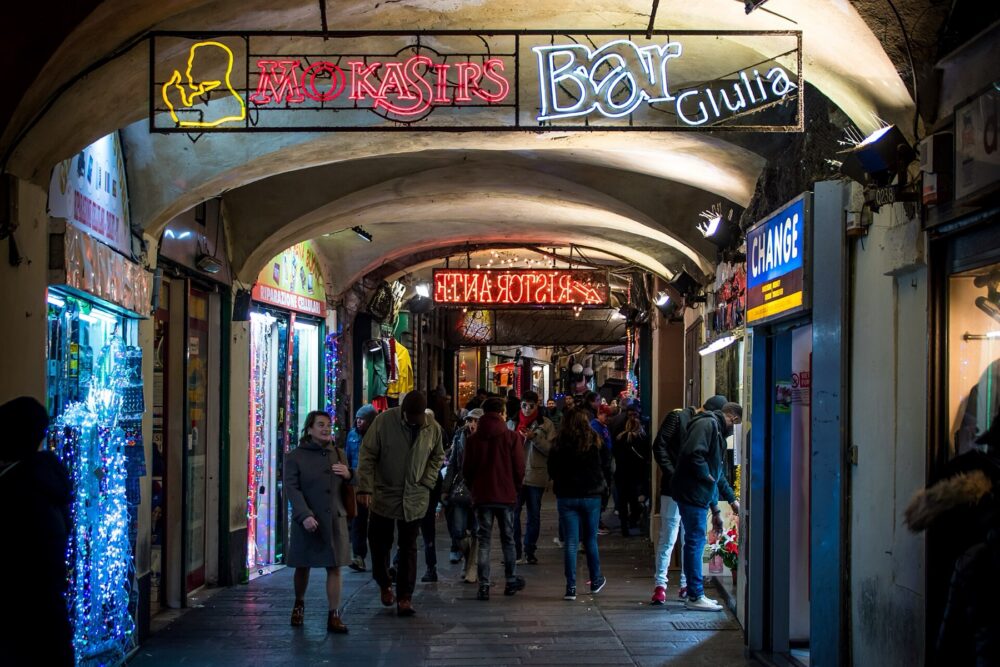 Shopping gallery in Genova, Italy, reflecting the mix of local retail and modern commerce.