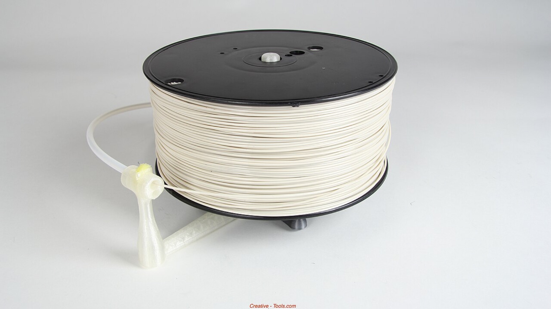 Assorted 3D printing filament spools in multiple colors