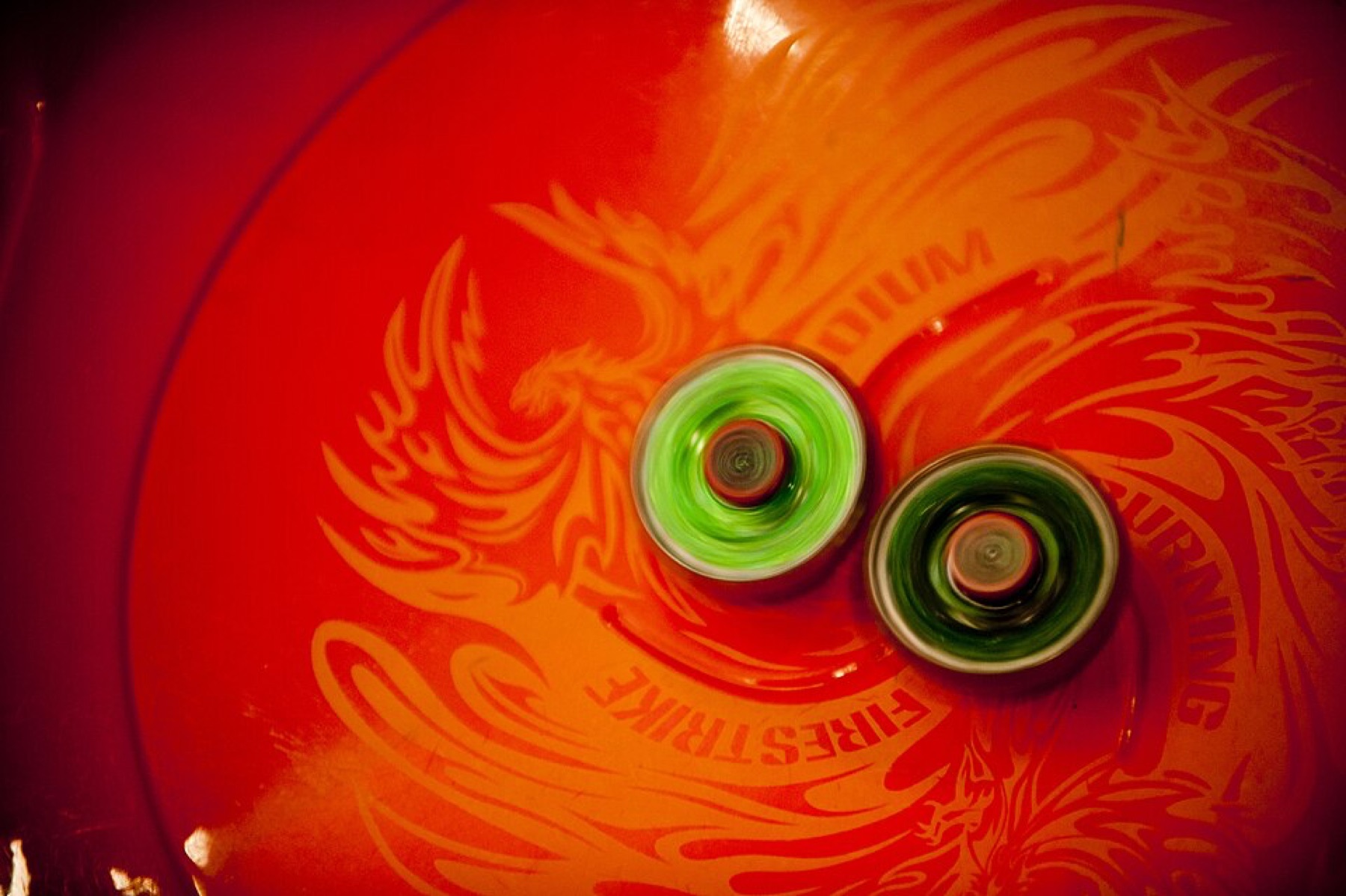 Kids playing Beyblade at a tournament in a stadium