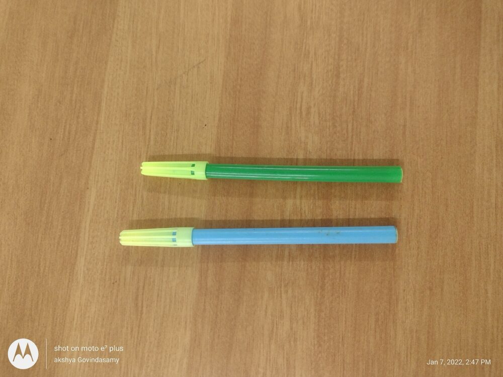Colorful sketch pens lined up in a row