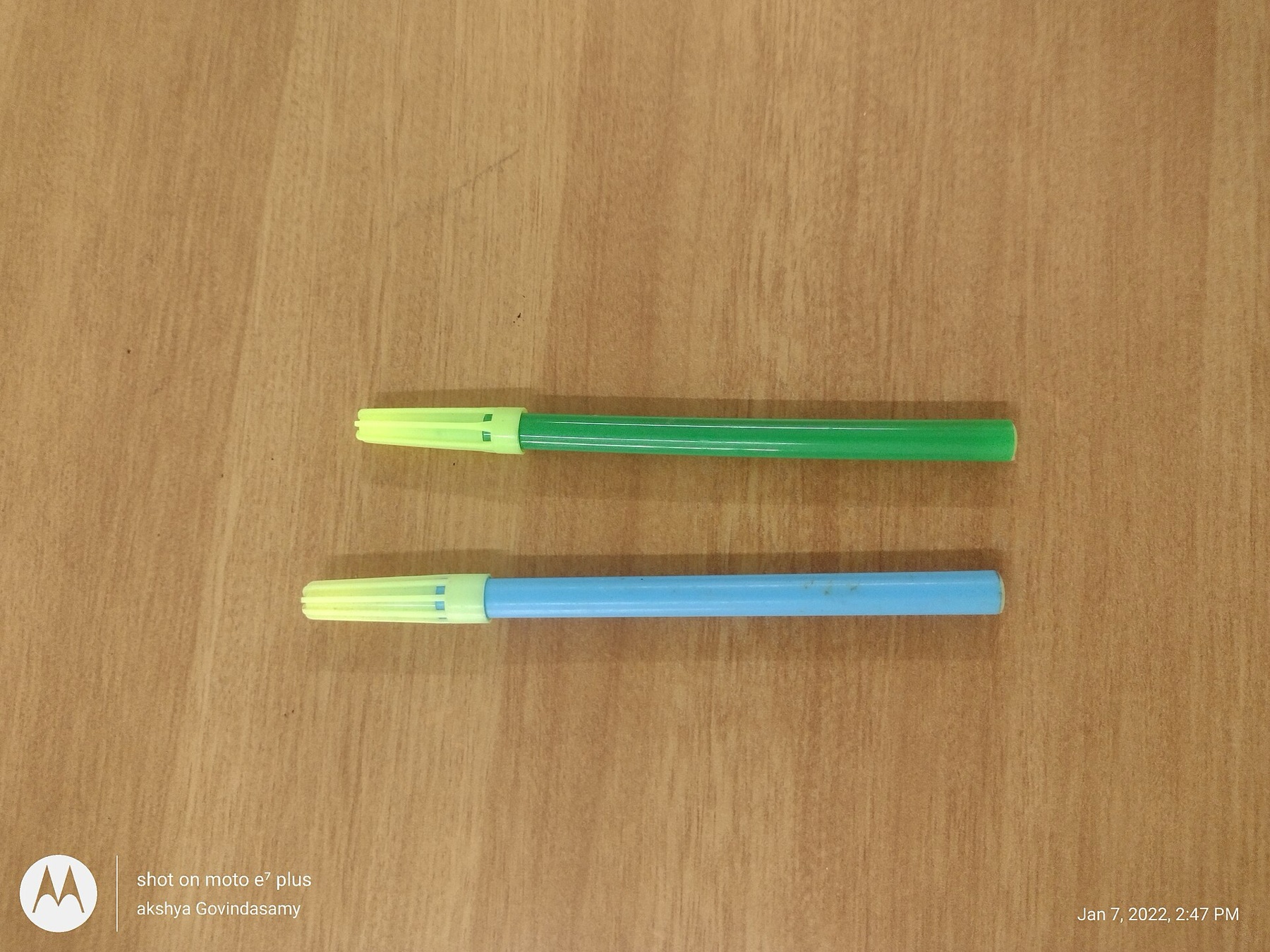 Colorful sketch pens lined up in a row