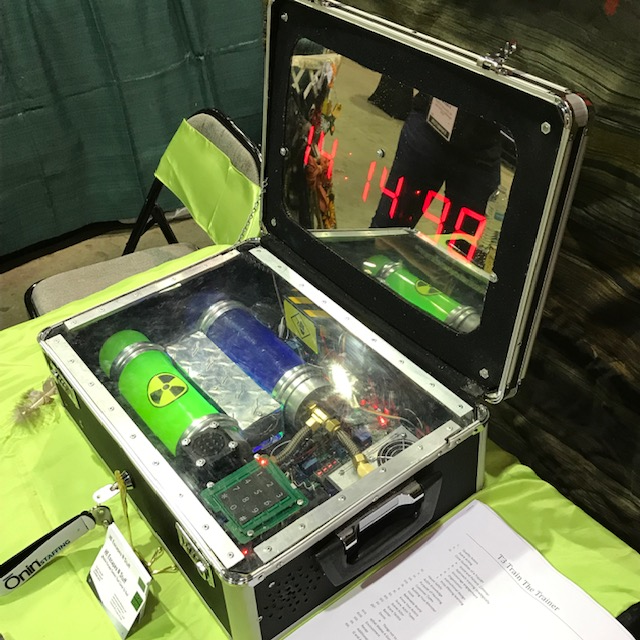 Themed escape room-style prop with mechanical and decorative elements