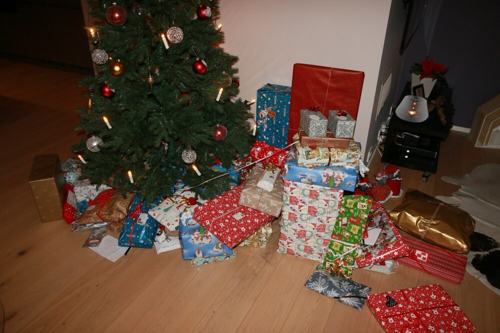Wrapped Christmas gifts under tree