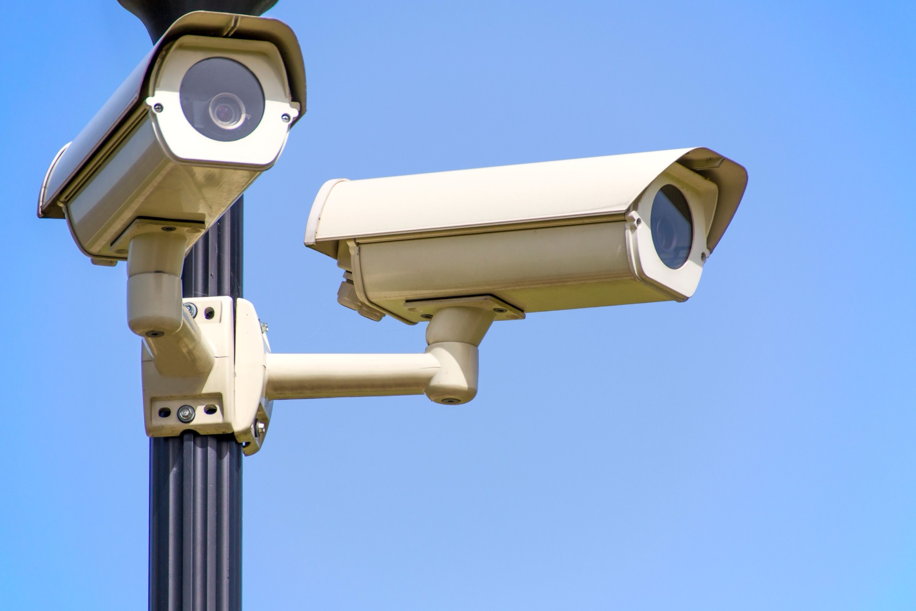 Outdoor CCTV dome camera mounted on a building facade
