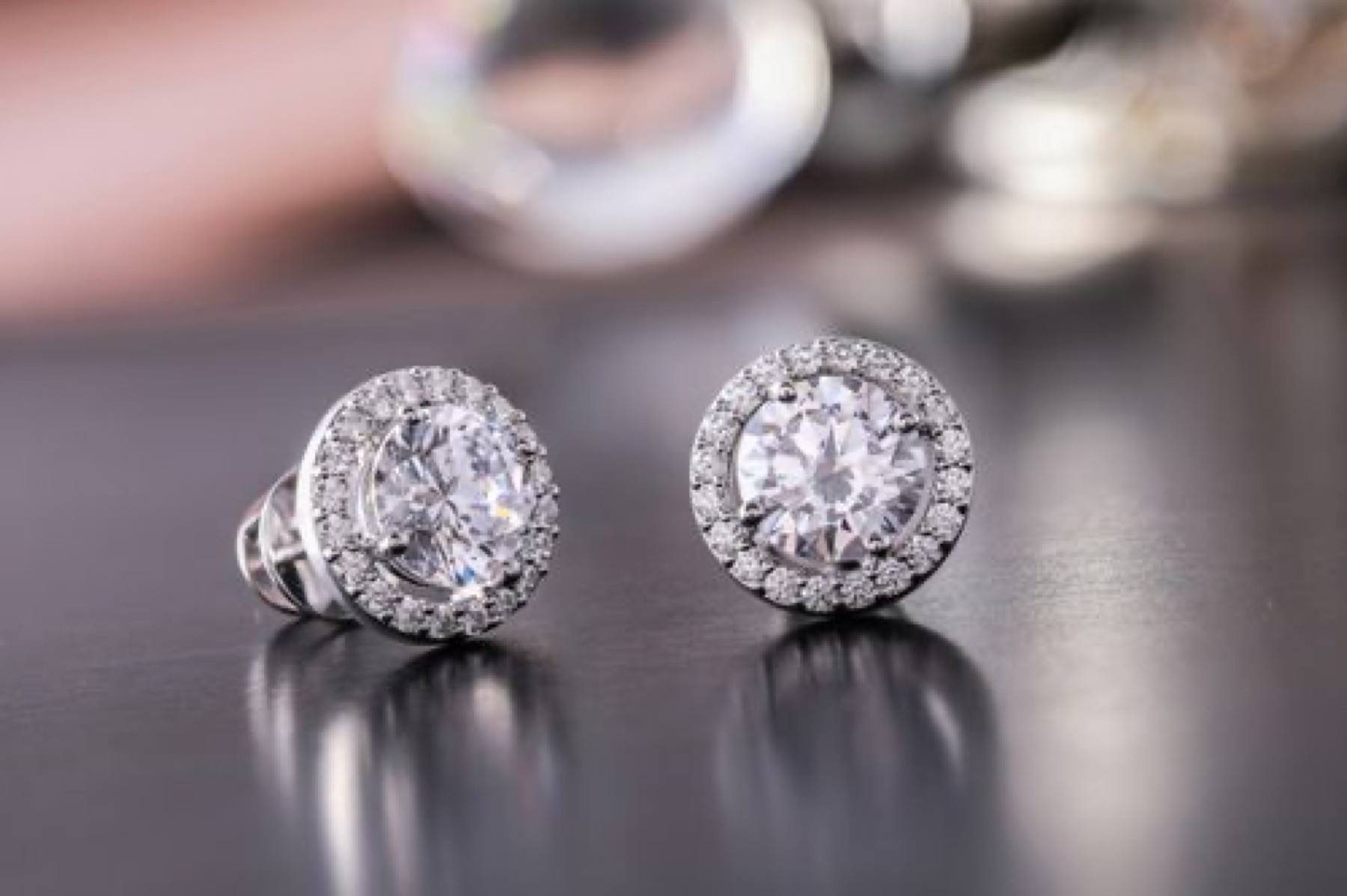 Close-up shot of diamond rings on a dark background