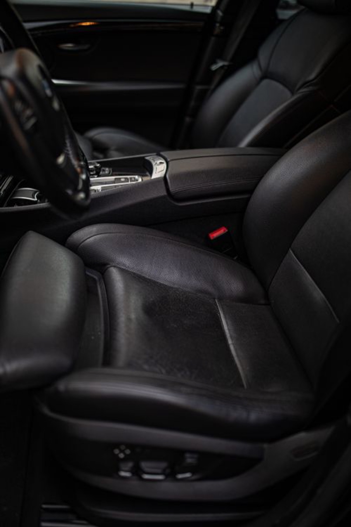 Black leather car seats interior close-up