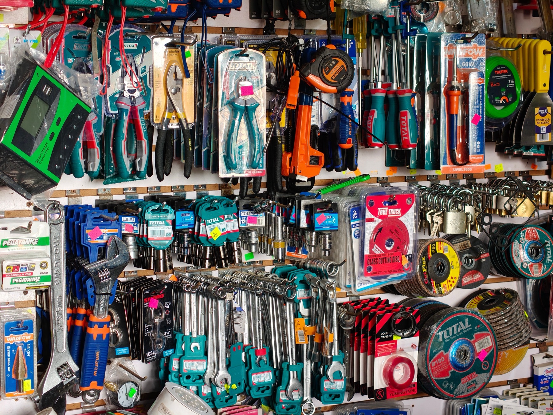 Hardware store aisle with tools and parts illustrating auto and hardware supply options