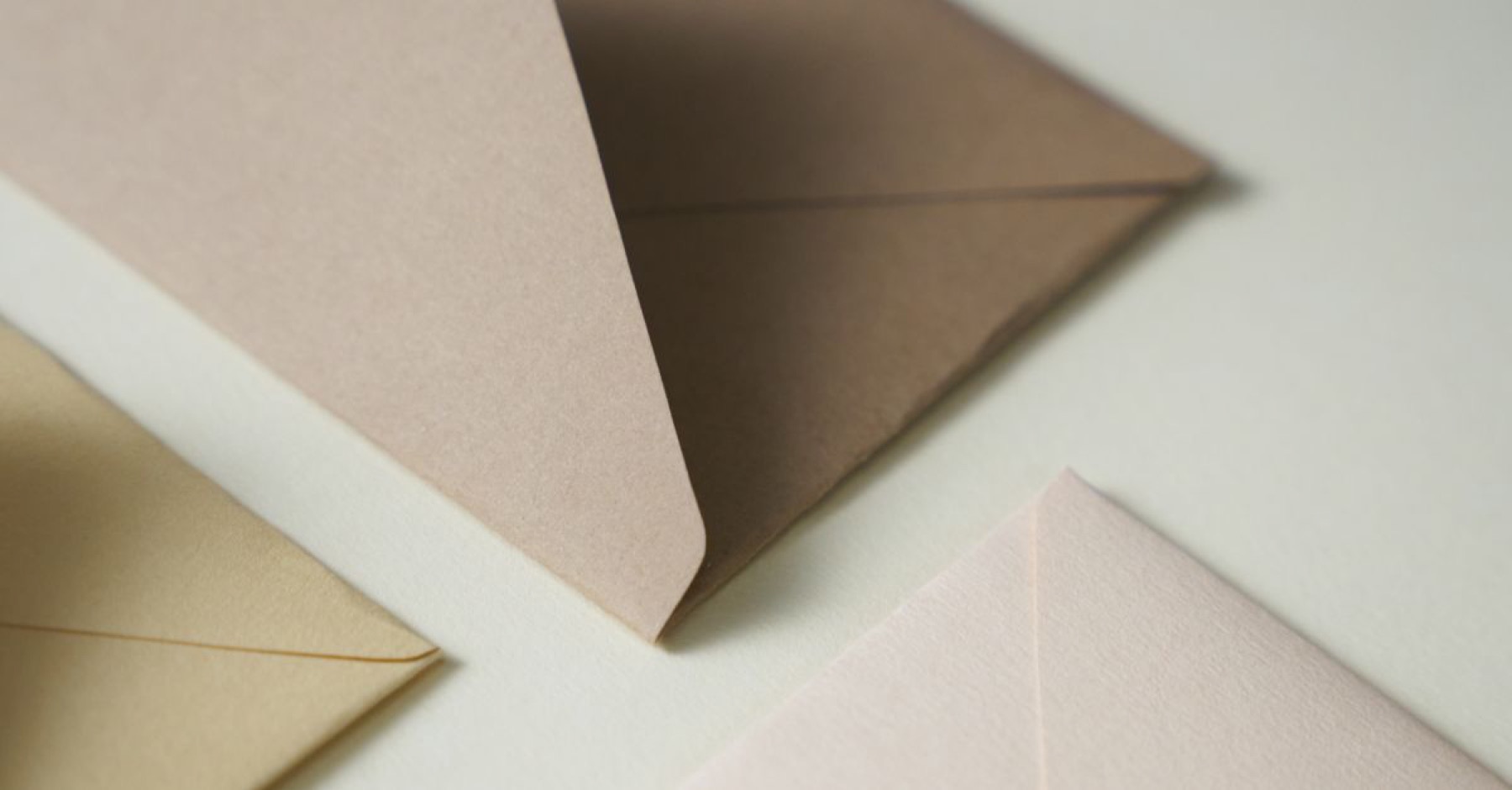 Assorted envelopes on a white background illustrating paper mail supplies