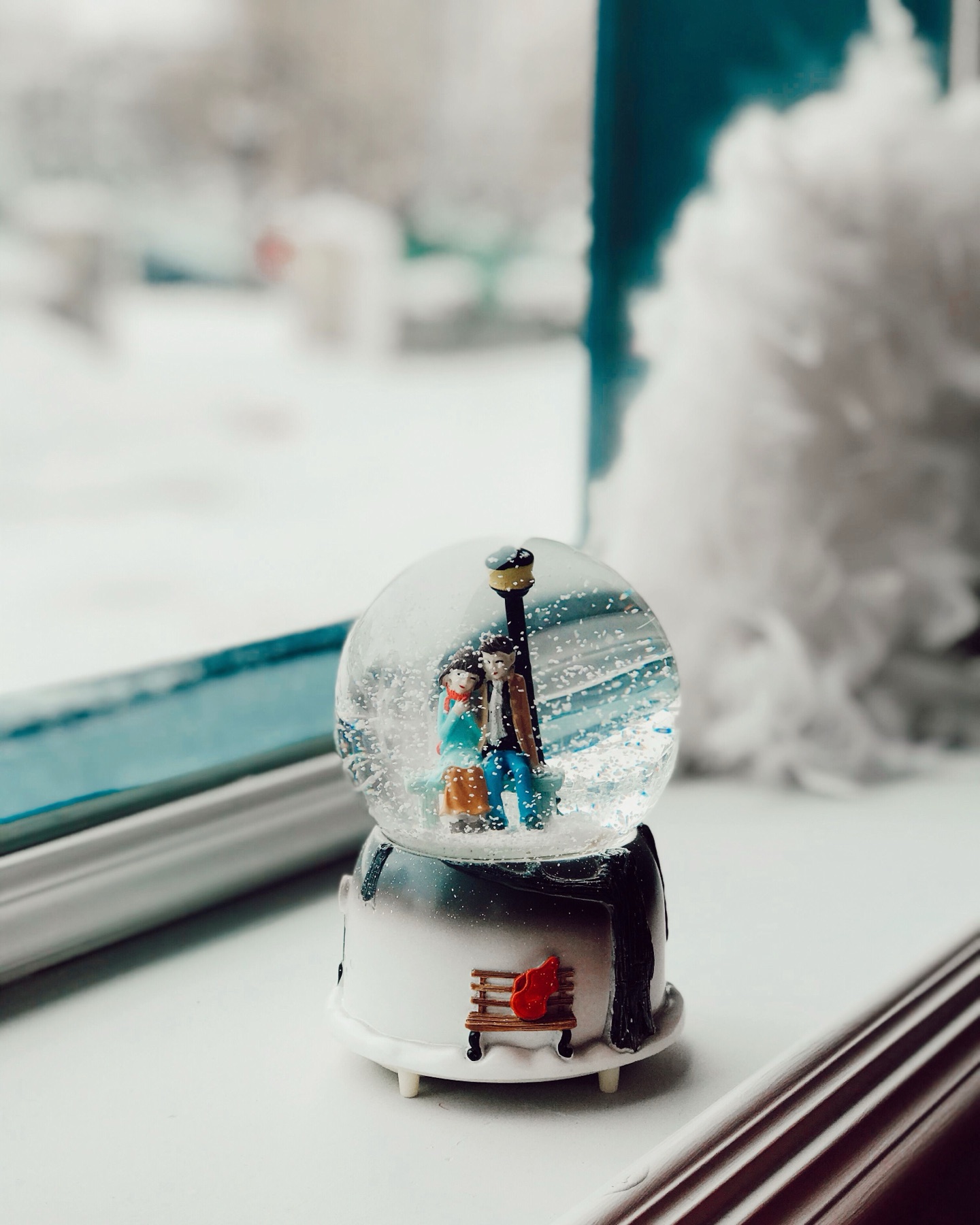 Online sourcing scene illustrating Unicorn Snow Globes