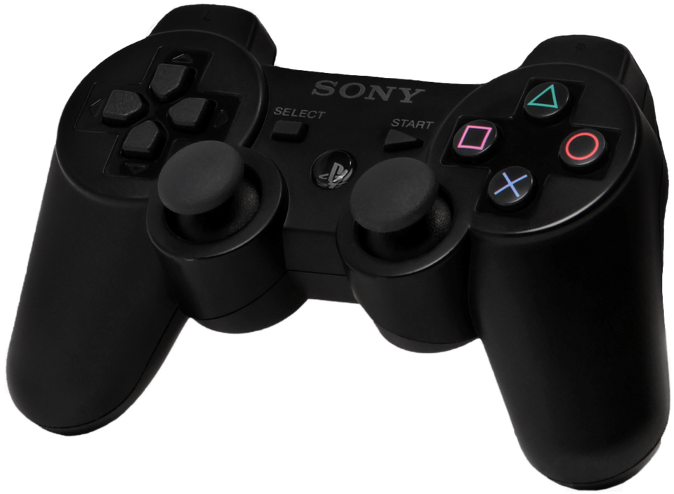 Manette PS3 DualShock 3 noire posée sur une table de démonstration