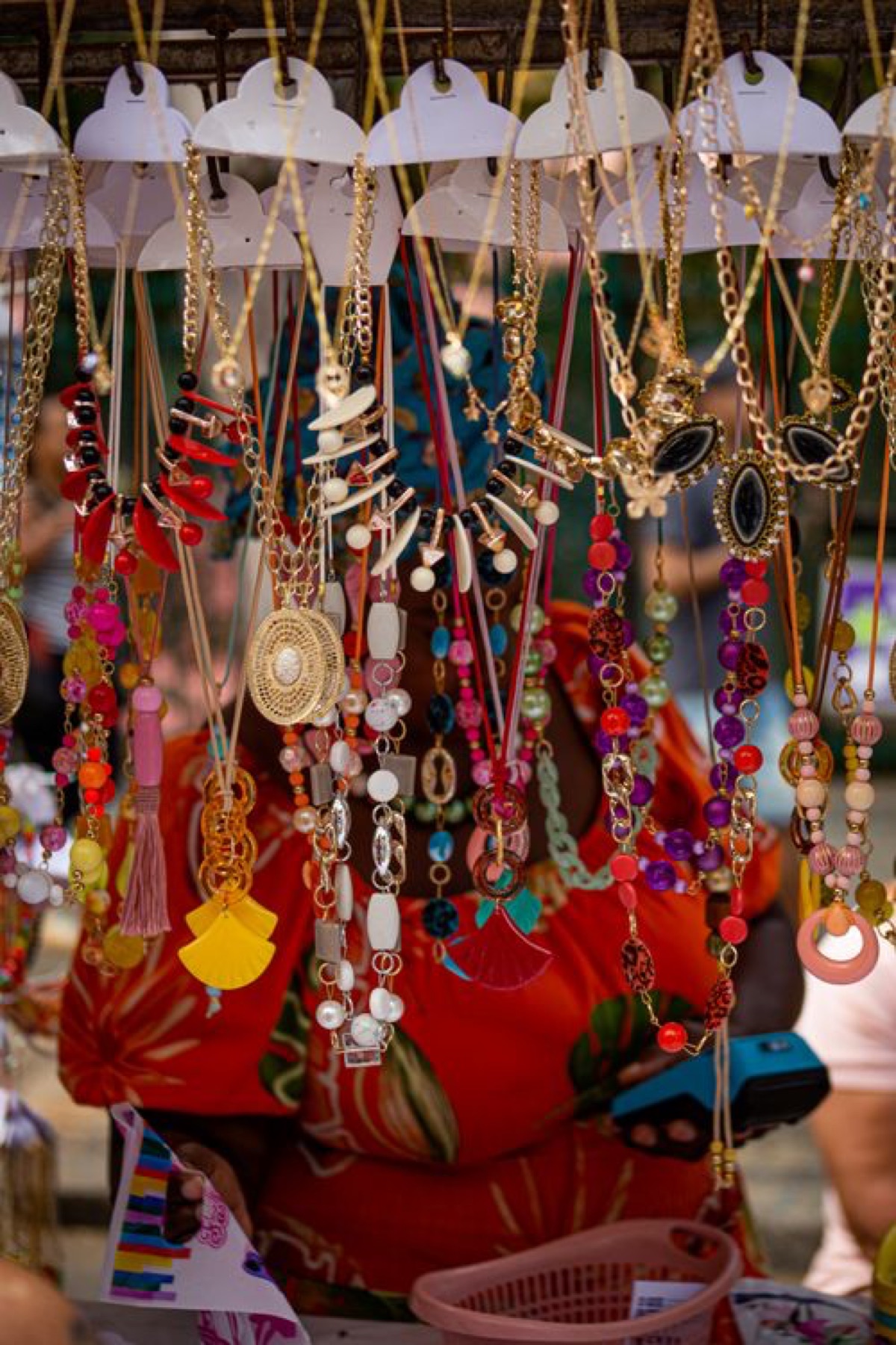 Display of jewelry at a market stall illustrating sourcing channels