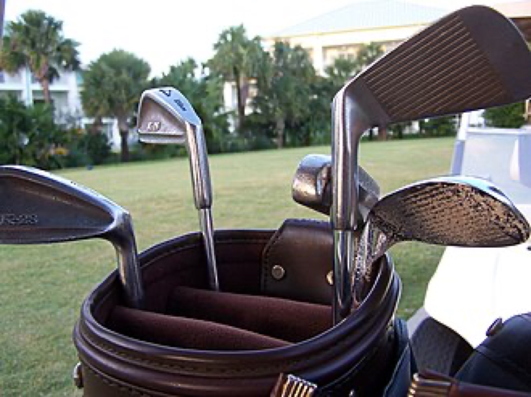Close-up of several golf clubs, illustrating the need to match model and specs exactly across listings