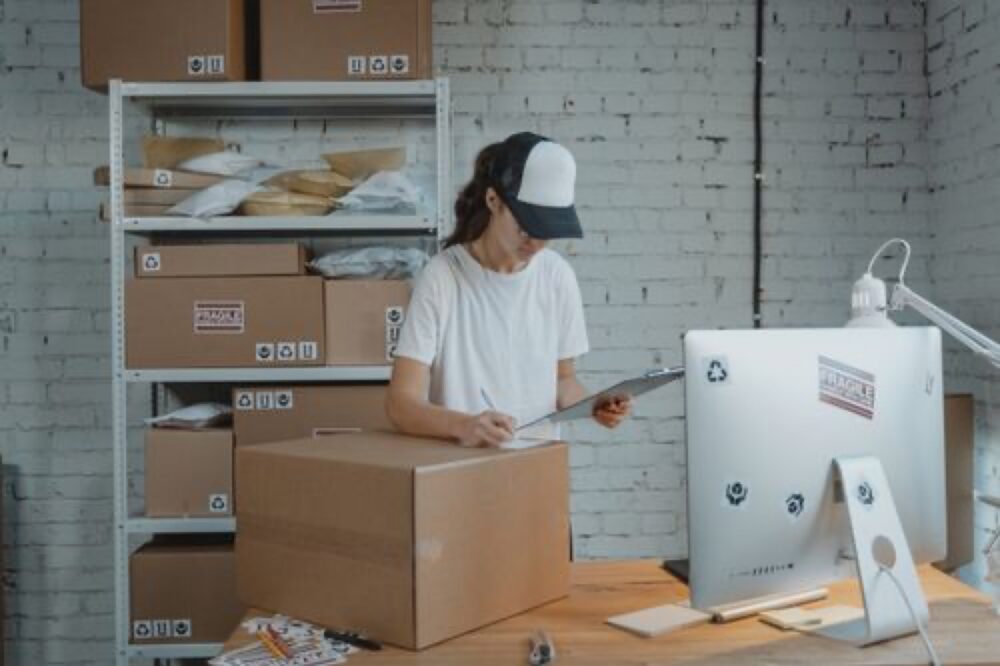 Online sourcing scene illustrating ecommerce warehouse inventory small business
