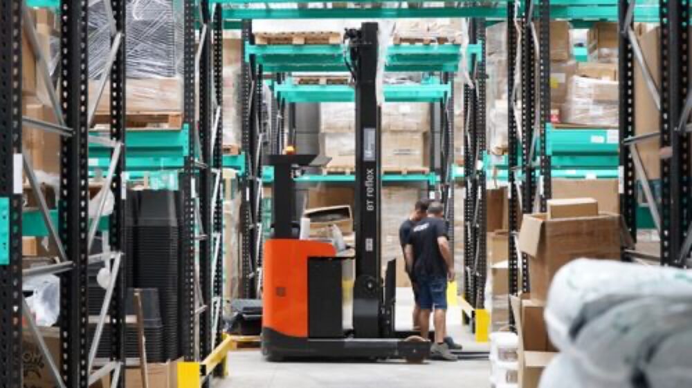 Online sourcing scene illustrating ecommerce warehouse inventory small business