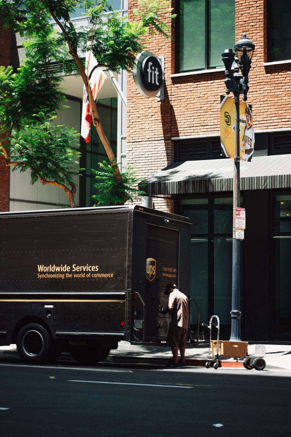Online sourcing scene illustrating UPS Marketplace and Shipping