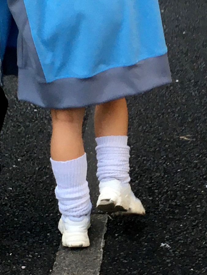 White loose socks styled with black shoes in Tokyo