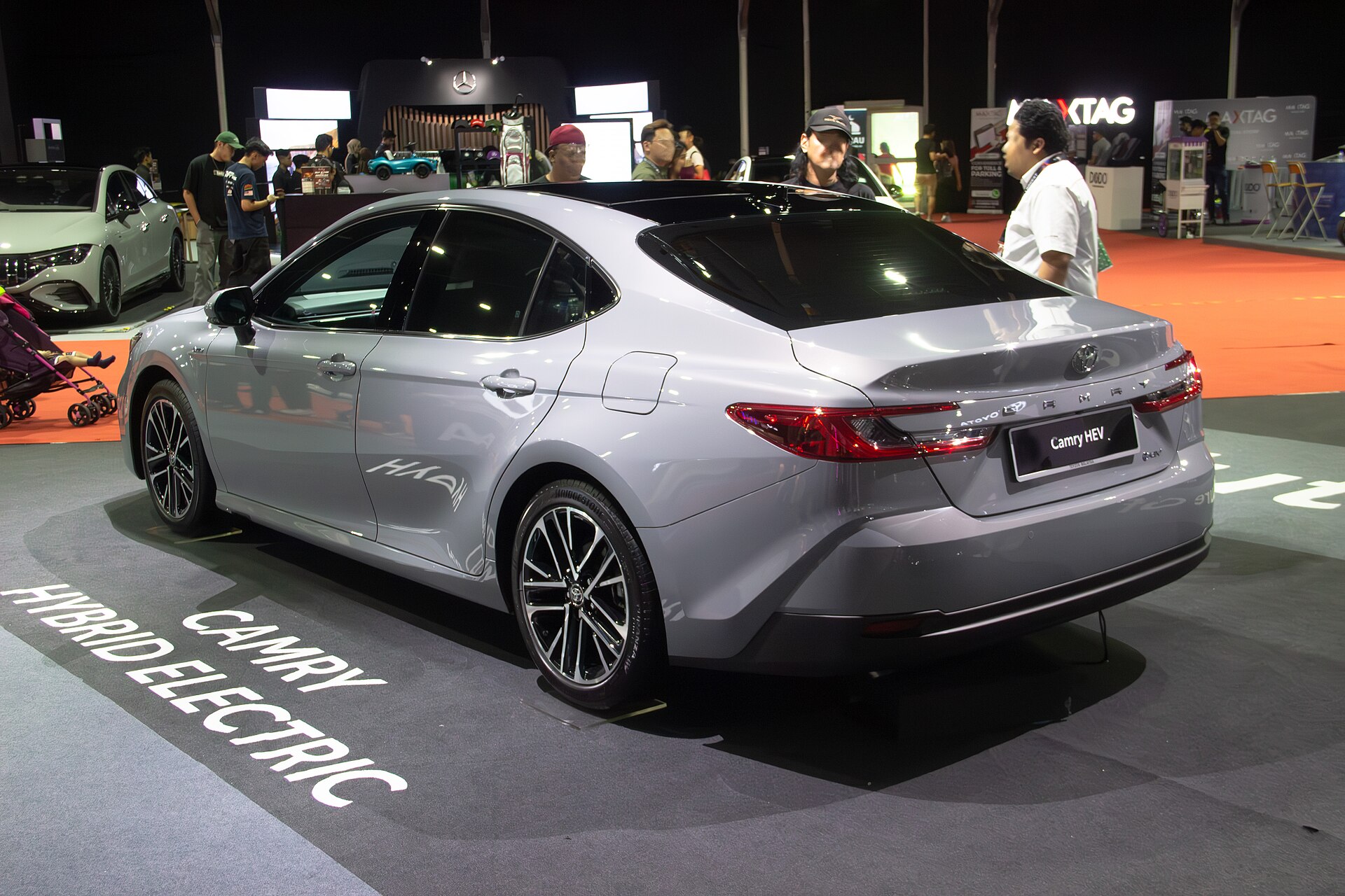 Rear view of a 2025 Toyota Camry XV80 showing the bumper cover, reflectors, lower trim, and panel alignment