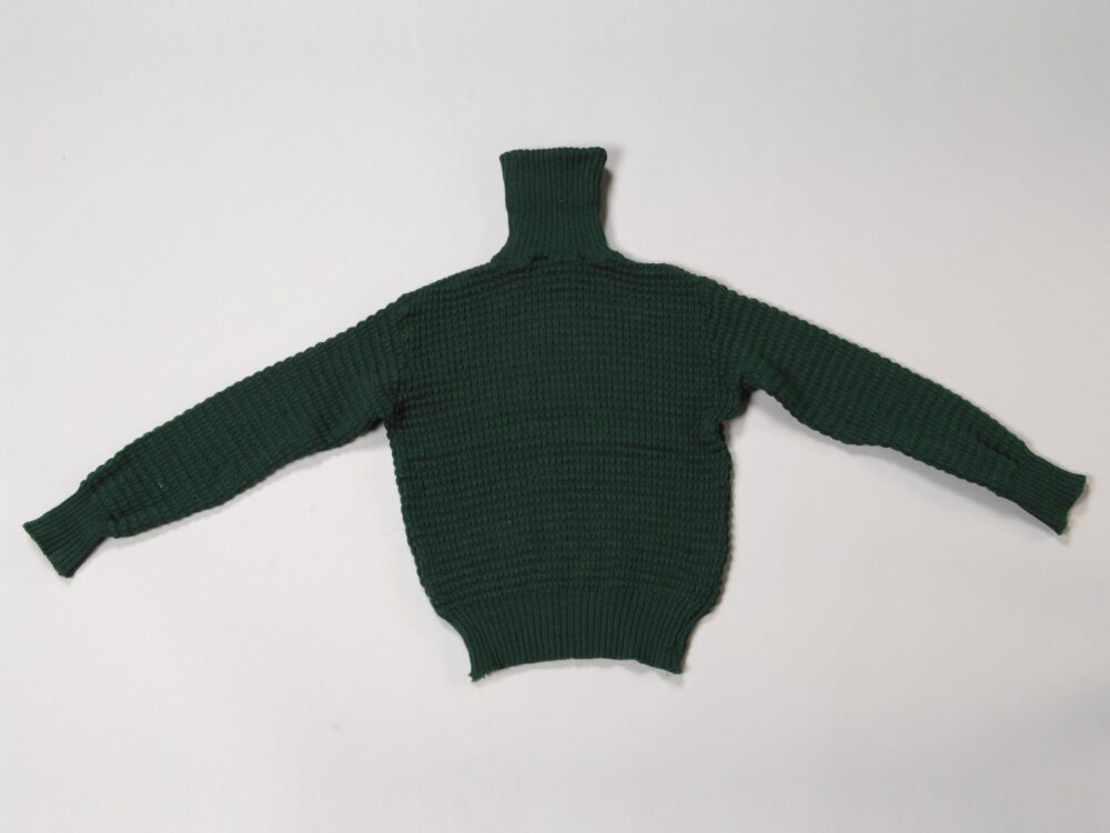 Dark green knitted children's turtleneck sweater