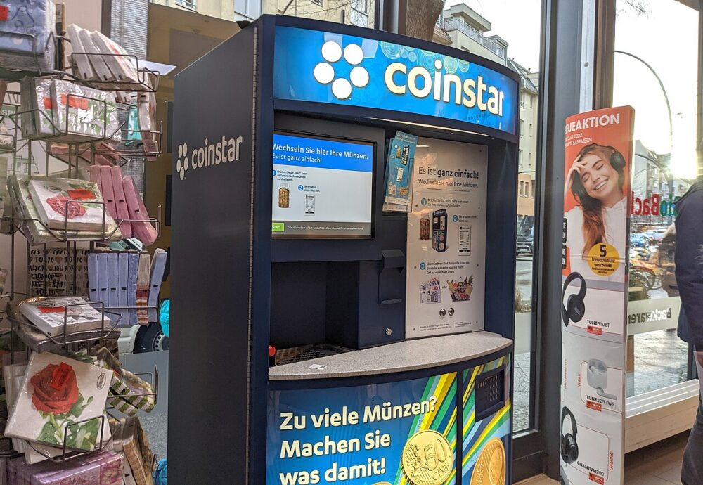 A public coin-sorting and deposit machine in a supermarket
