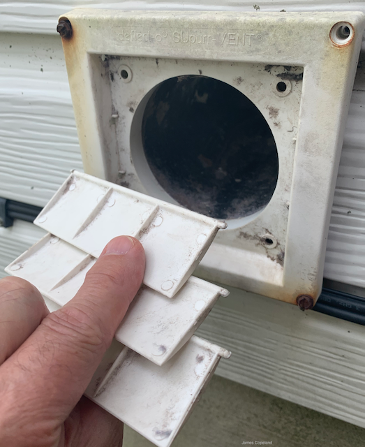 Exterior clothes-dryer vent that should be checked for restricted airflow