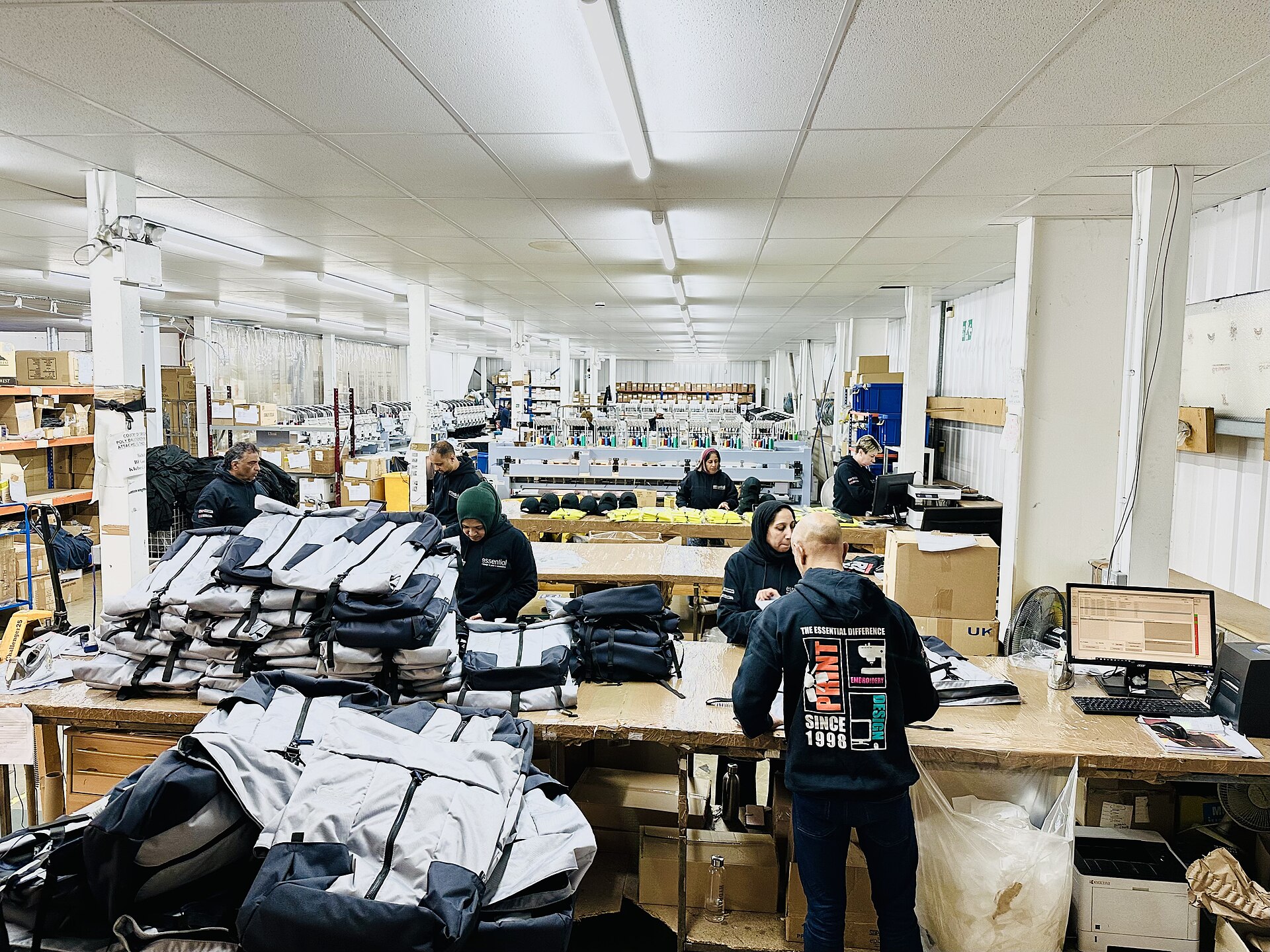 Production staff working inside a garment manufacturing facility