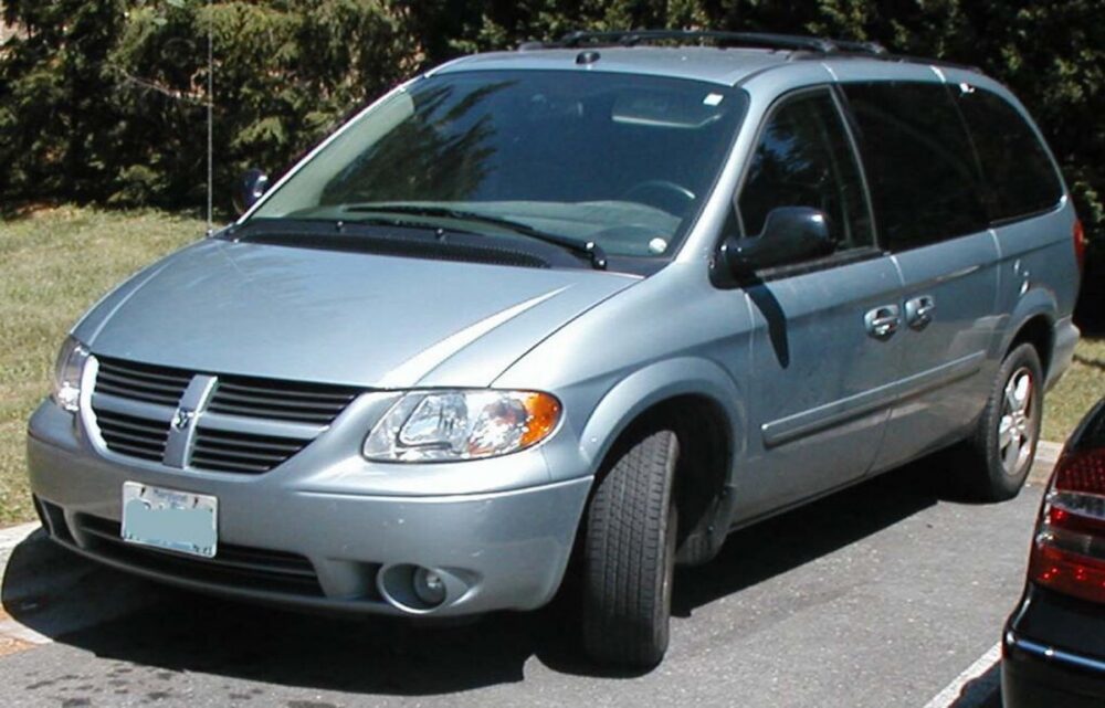 Dodge Grand Caravan minivan parked on a street